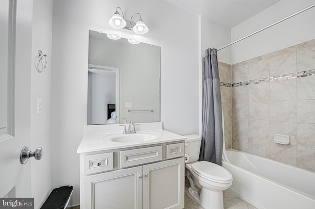 full bathroom featuring shower / tub combo, vanity, tile patterned floors, and toilet