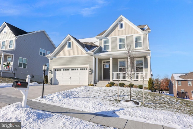 view of front of house featuring a porch and a garage