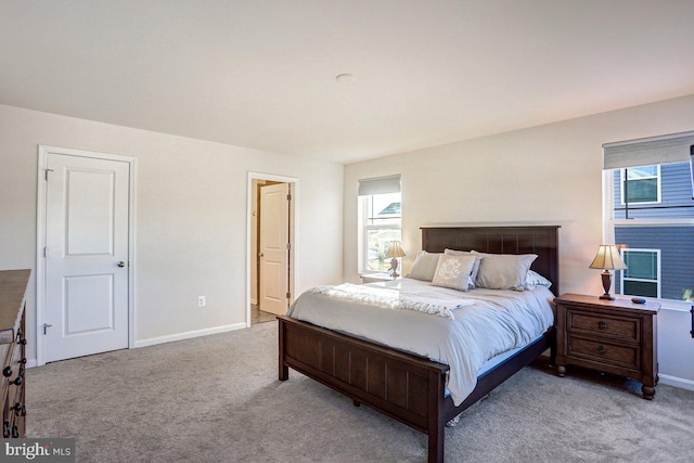 bedroom with light carpet