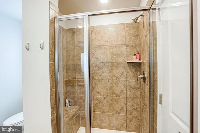 bathroom with an enclosed shower