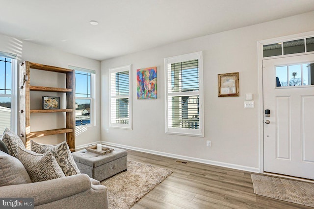 interior space with hardwood / wood-style floors