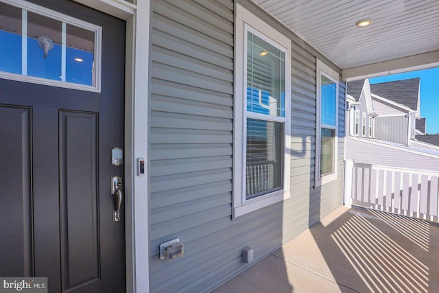 property entrance with a porch