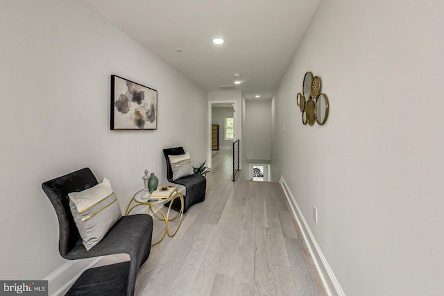 hallway featuring light hardwood / wood-style flooring