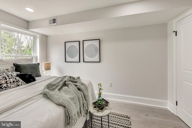 bedroom featuring hardwood / wood-style flooring