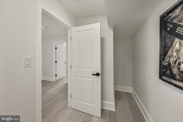 hallway featuring light hardwood / wood-style flooring