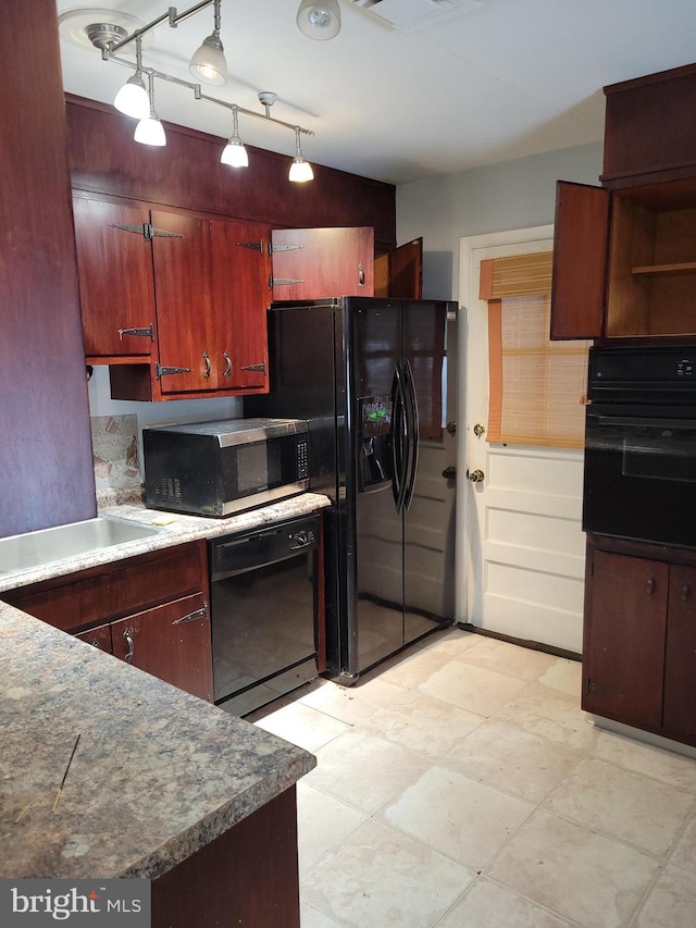 kitchen featuring track lighting, black appliances, and open shelves