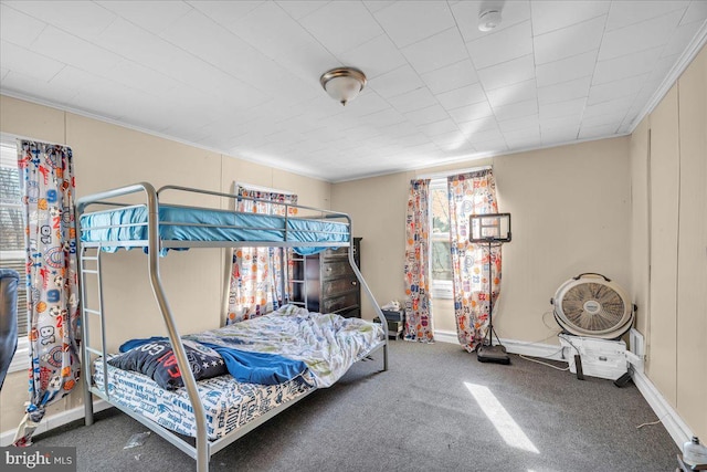 bedroom with carpet and crown molding