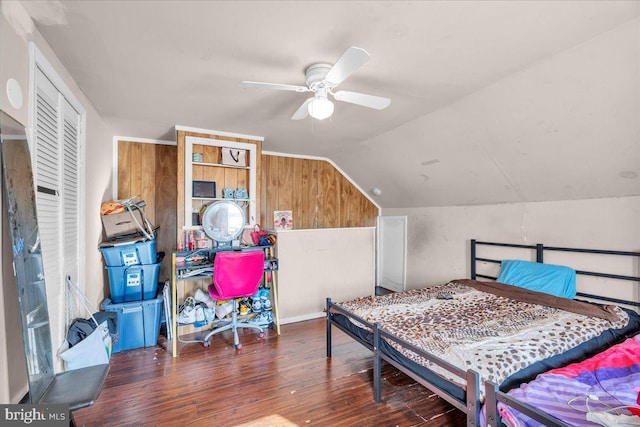 bedroom featuring lofted ceiling, ceiling fan, and dark wood-type flooring