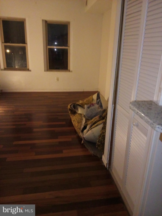 living area featuring dark hardwood / wood-style floors