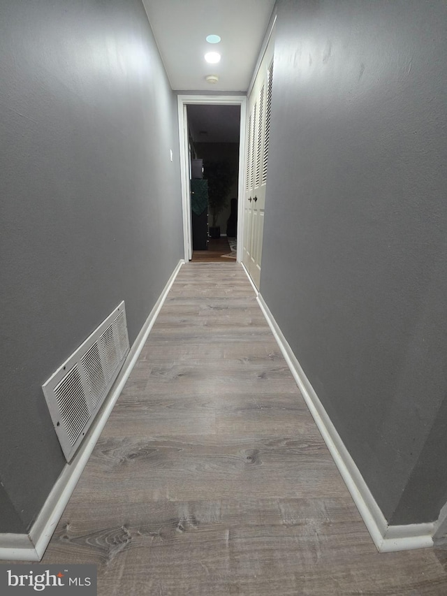 hall featuring light hardwood / wood-style flooring