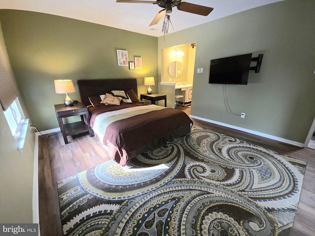 bedroom featuring ceiling fan and hardwood / wood-style flooring