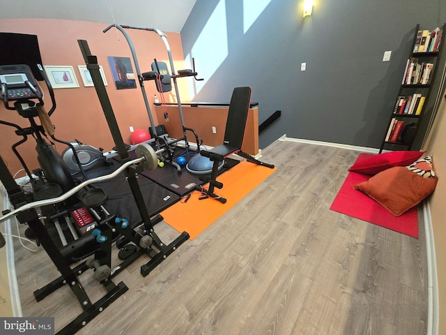 workout room with hardwood / wood-style floors