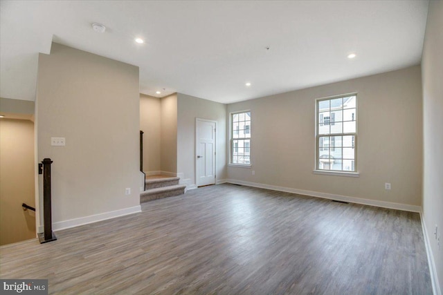 unfurnished living room featuring light hardwood / wood-style floors