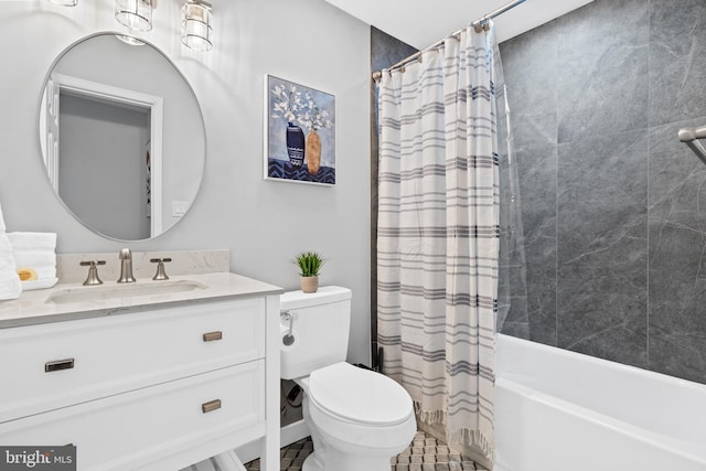 full bathroom featuring shower / tub combo with curtain, vanity, and toilet