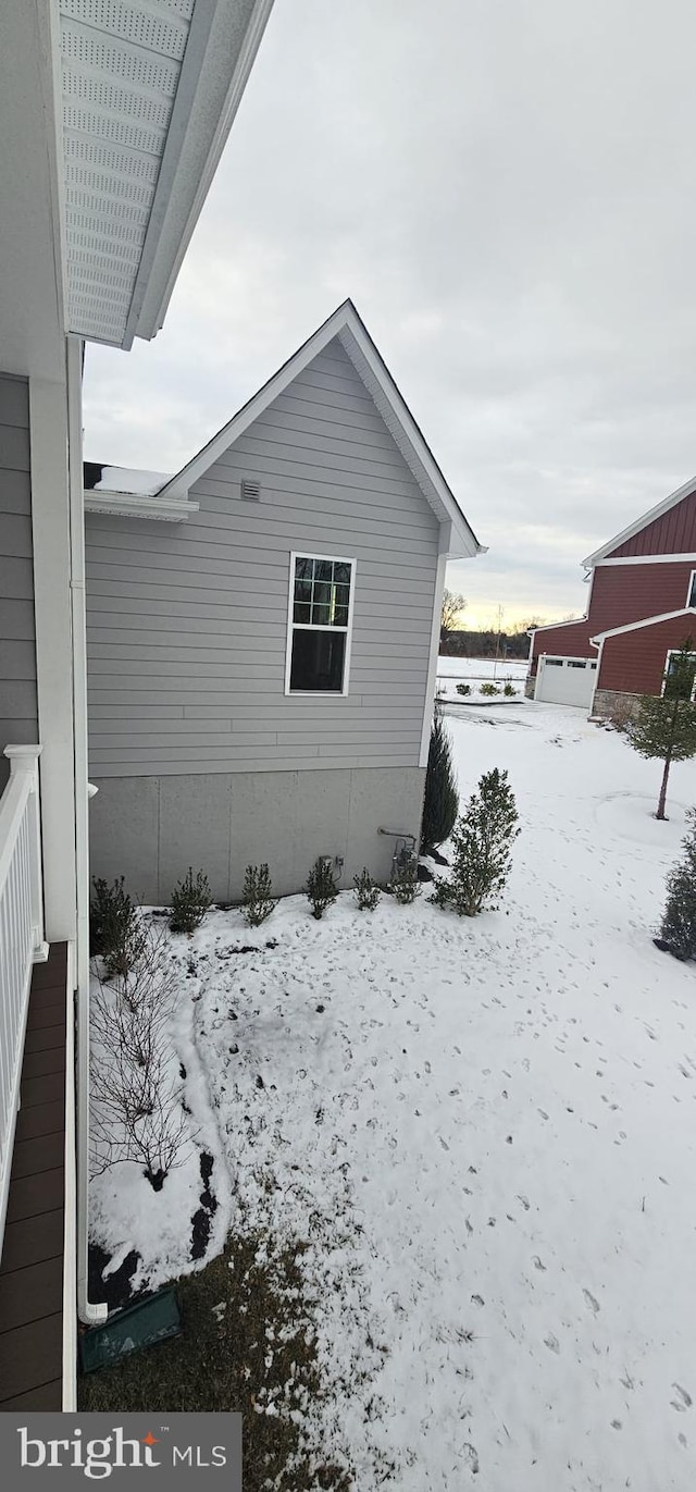 view of snow covered property