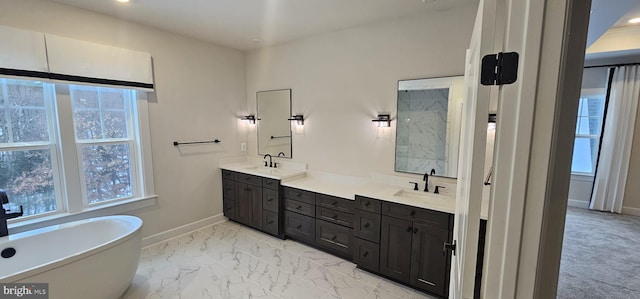 bathroom featuring a bathing tub and vanity