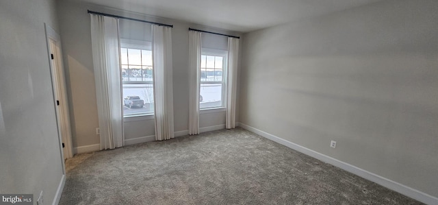 empty room featuring carpet floors