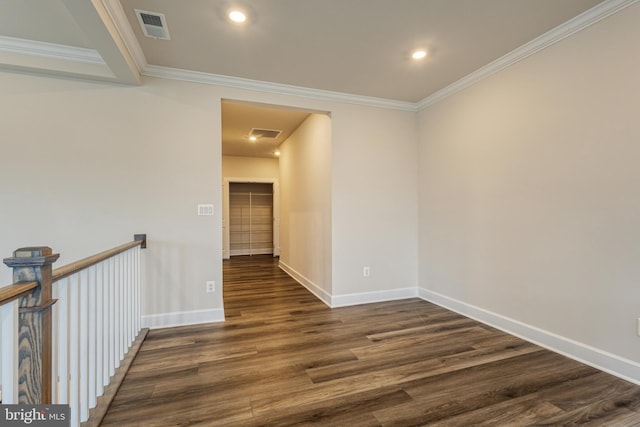 corridor featuring crown molding and dark hardwood / wood-style flooring