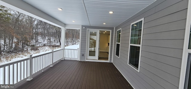 view of snow covered deck