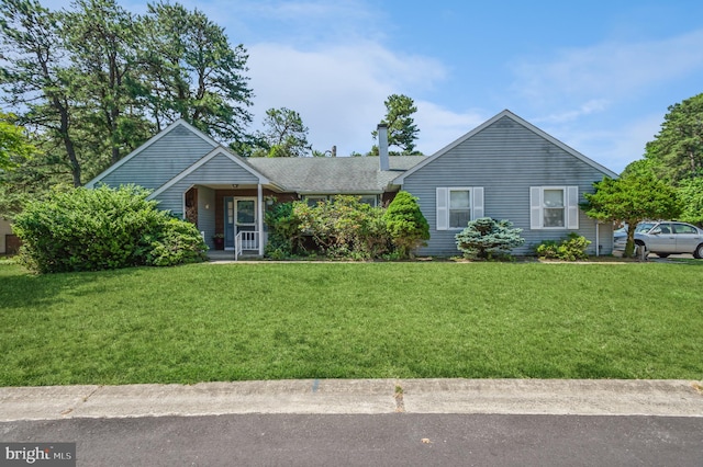 view of front facade with a front lawn