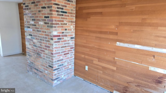 interior details featuring wood walls