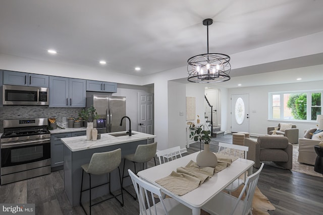 dining area featuring recessed lighting and dark wood finished floors