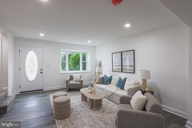 living room featuring recessed lighting, wood finished floors, and baseboards