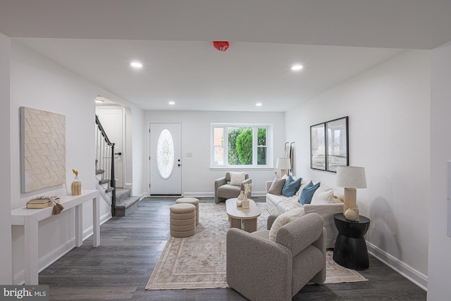 living room with dark wood finished floors, stairway, recessed lighting, and baseboards