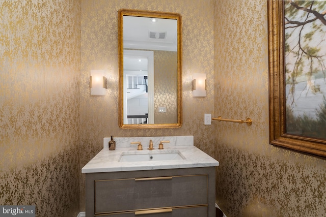 bathroom with visible vents and vanity