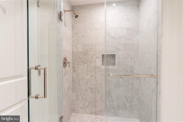 full bathroom with a shower stall