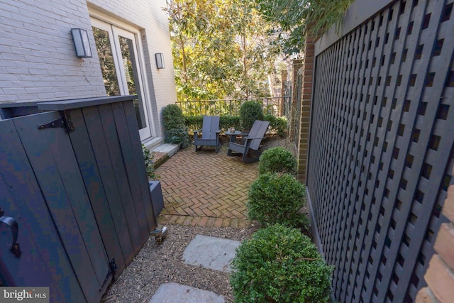 view of yard with a patio and fence