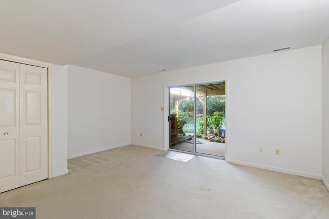 view of carpeted spare room