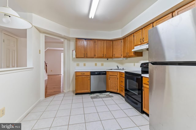 kitchen featuring light tile patterned floors, sink, and appliances with stainless steel finishes