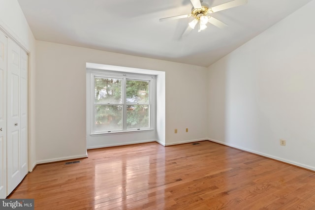 unfurnished bedroom featuring light hardwood / wood-style floors and ceiling fan