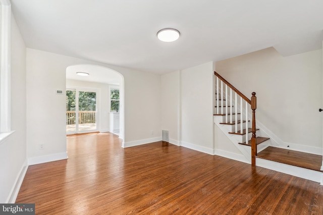 unfurnished room with wood-type flooring