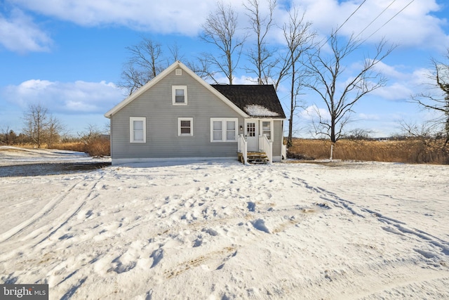 view of snow covered house