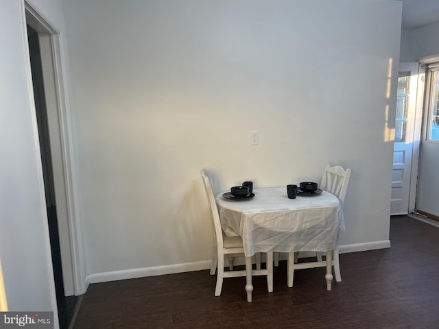 dining room featuring dark hardwood / wood-style floors