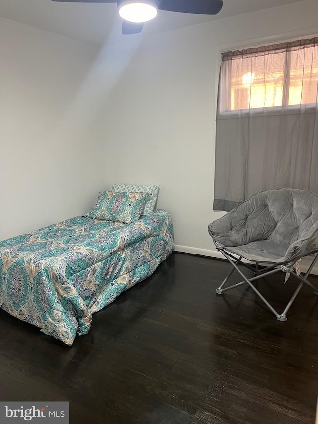 bedroom featuring dark hardwood / wood-style flooring