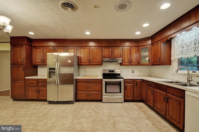 kitchen featuring stainless steel appliances and sink