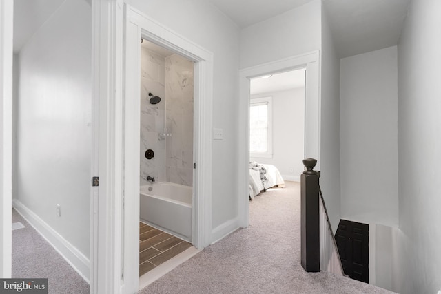 bathroom featuring tiled shower / bath combo