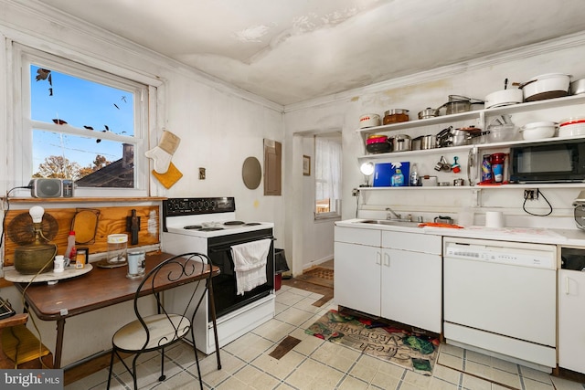 kitchen with white cabinetry, sink, and white appliances