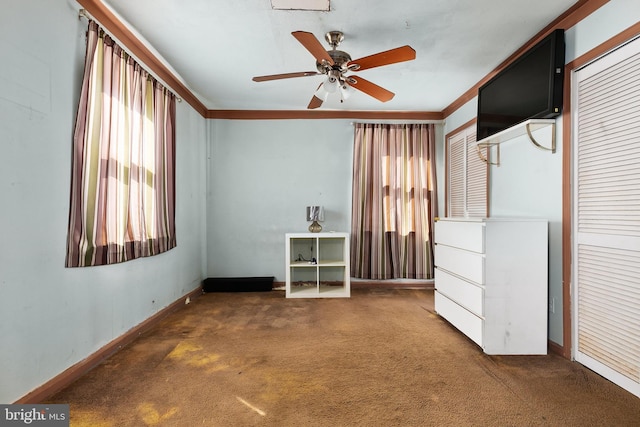 unfurnished bedroom with carpet flooring, a closet, and ceiling fan