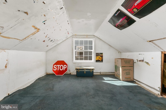 bonus room featuring lofted ceiling