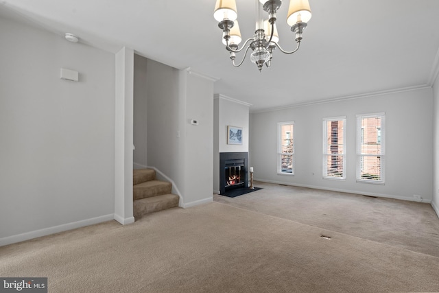 unfurnished living room featuring light carpet, a chandelier, and crown molding