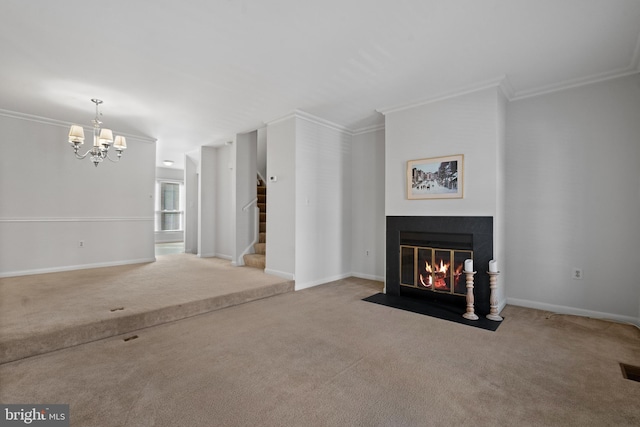 unfurnished living room with carpet floors, a notable chandelier, and crown molding