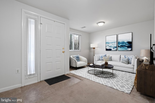 living room with light colored carpet