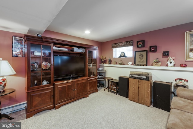 carpeted living room with a baseboard radiator