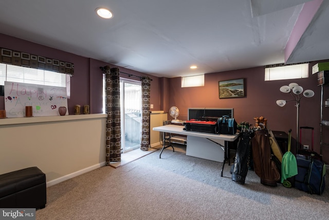 carpeted office space featuring plenty of natural light