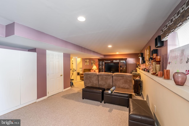 living room featuring light colored carpet