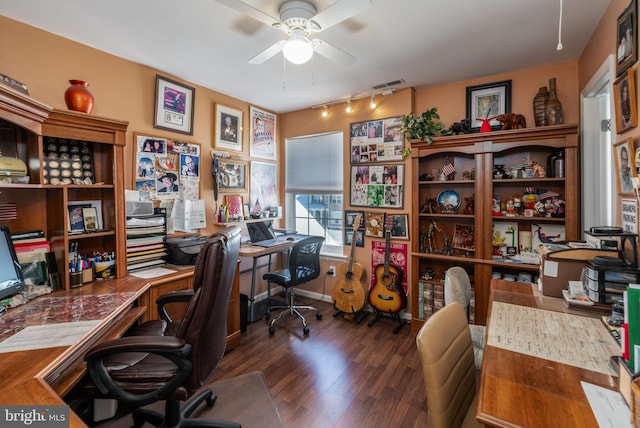 office space with ceiling fan, track lighting, and dark hardwood / wood-style floors